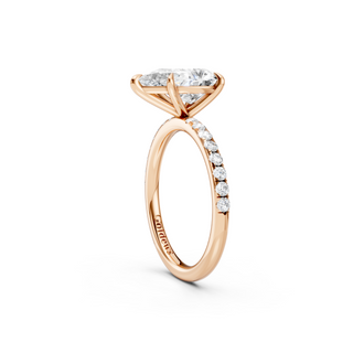 Pear Solitaire Engagement Ring With French Pave Band
