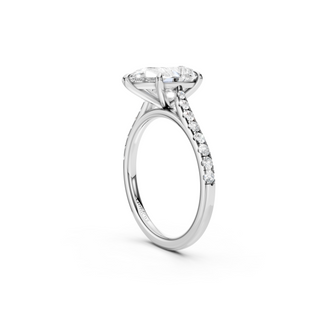 #R67214 - Pear Solitaire Shoulder Engagement Ring With French Pave Band